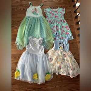 Set of Four Girls' Dresses with Fun Prints